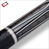 Close-up of a black pool cue with decorative patterns on a white background