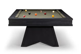 A modern dark wood pool table with a black triangular pedestal base and a light beige felt surface, shown from a high angle on a white background.