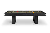 A modern pool table with a dark charcoal wood frame and legs, featuring a green felt surface with various billiard balls arranged on it, set against a plain white background.